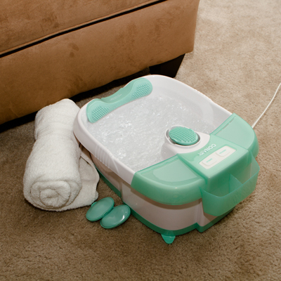CONAIR® Foot Spa with Massage, Bubbles and Heat - Rejuvenate your tired feet!  Foot spa features massaging bubble action with heat, percussion-type massager with three different attachments and easy toe-touch controls.